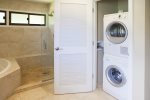 A washer and dryer is located in the master bedroom 